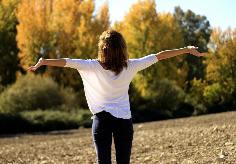 Girl Standing in the Sun